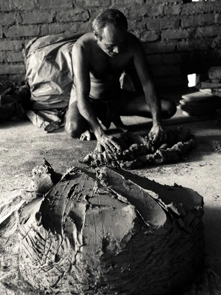 The four sculptors of Necktie Sculpture at work in the Brooklyn atelier